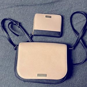Light pink and black Kate Spade purse with matching wallet. This was a gift.
